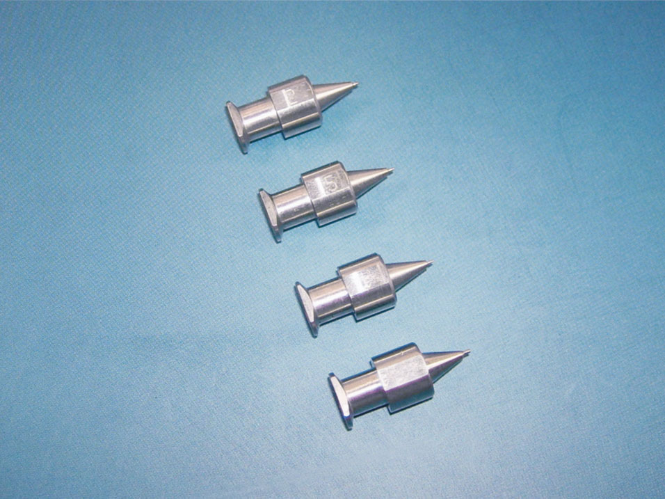 Integrated precision needle nozzle